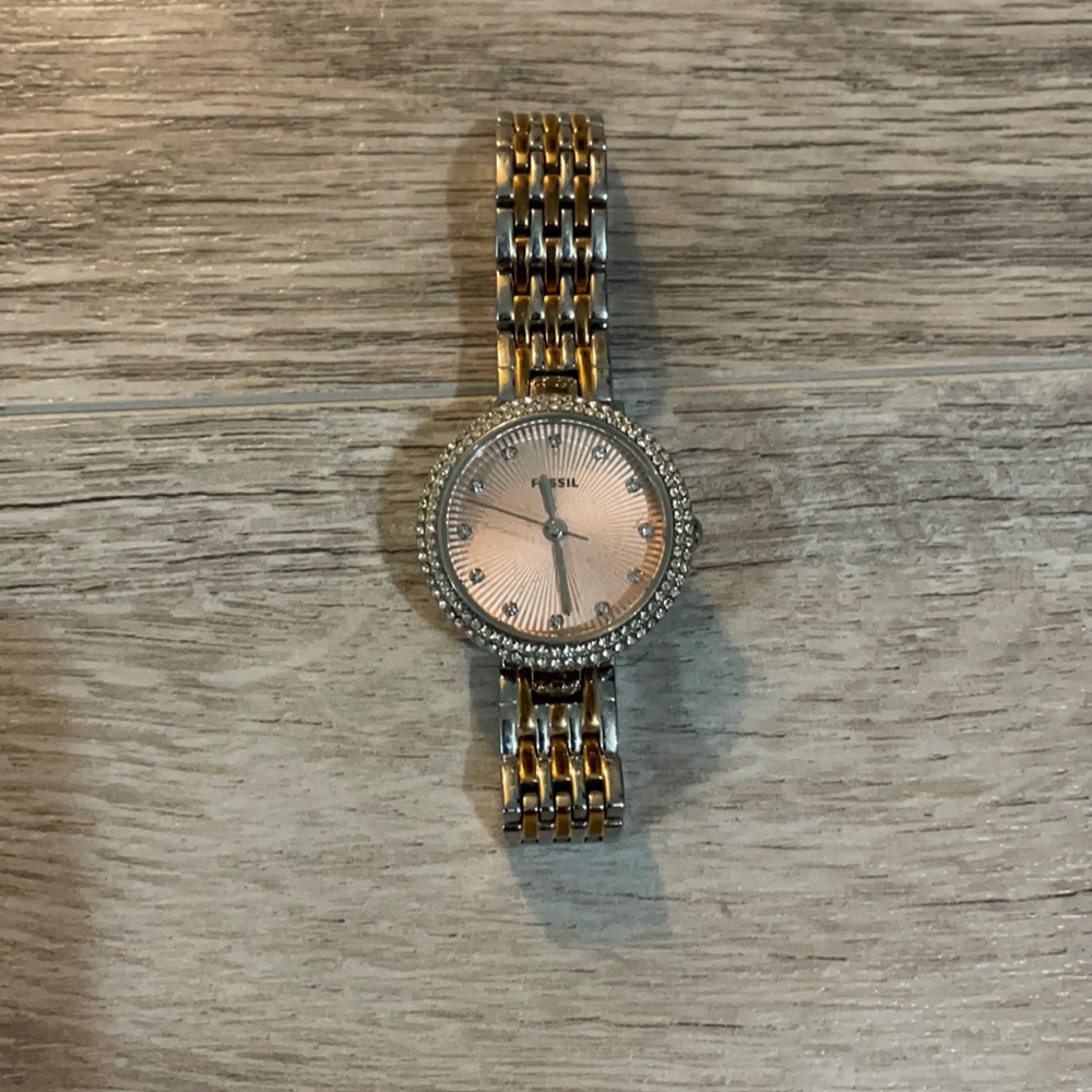 Rose gold and silver Fossil watch.